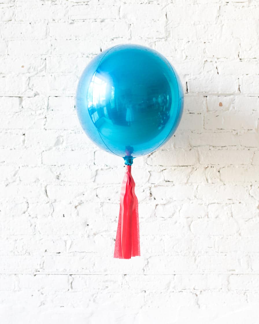 16in Blue Orb Foil Balloon and Red Skirt | Rental 16in Blue Orb Foil Balloon and Red Skirt | Rental