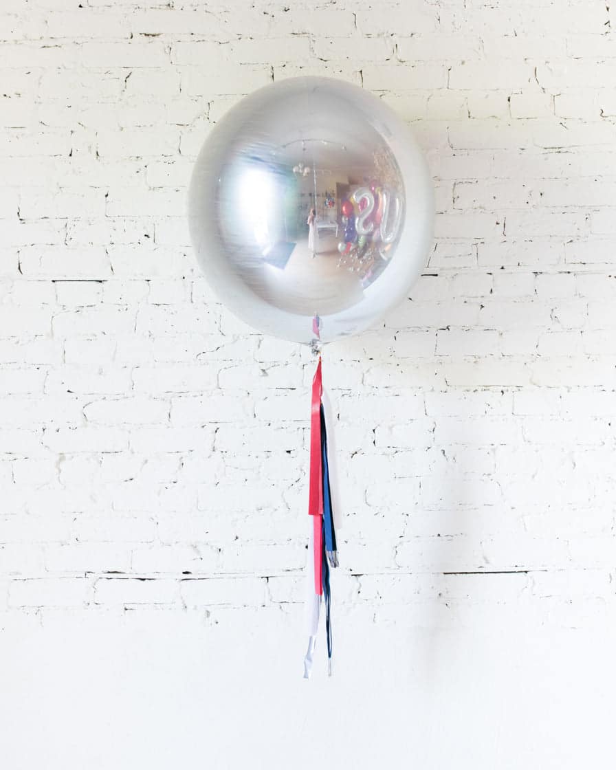 21in Silver Foil Orb Balloon and Red, White & Blue Half-Tassel | Rental 21in Silver Foil Orb Balloon and Red, White & Blue Half-Tassel | Rental