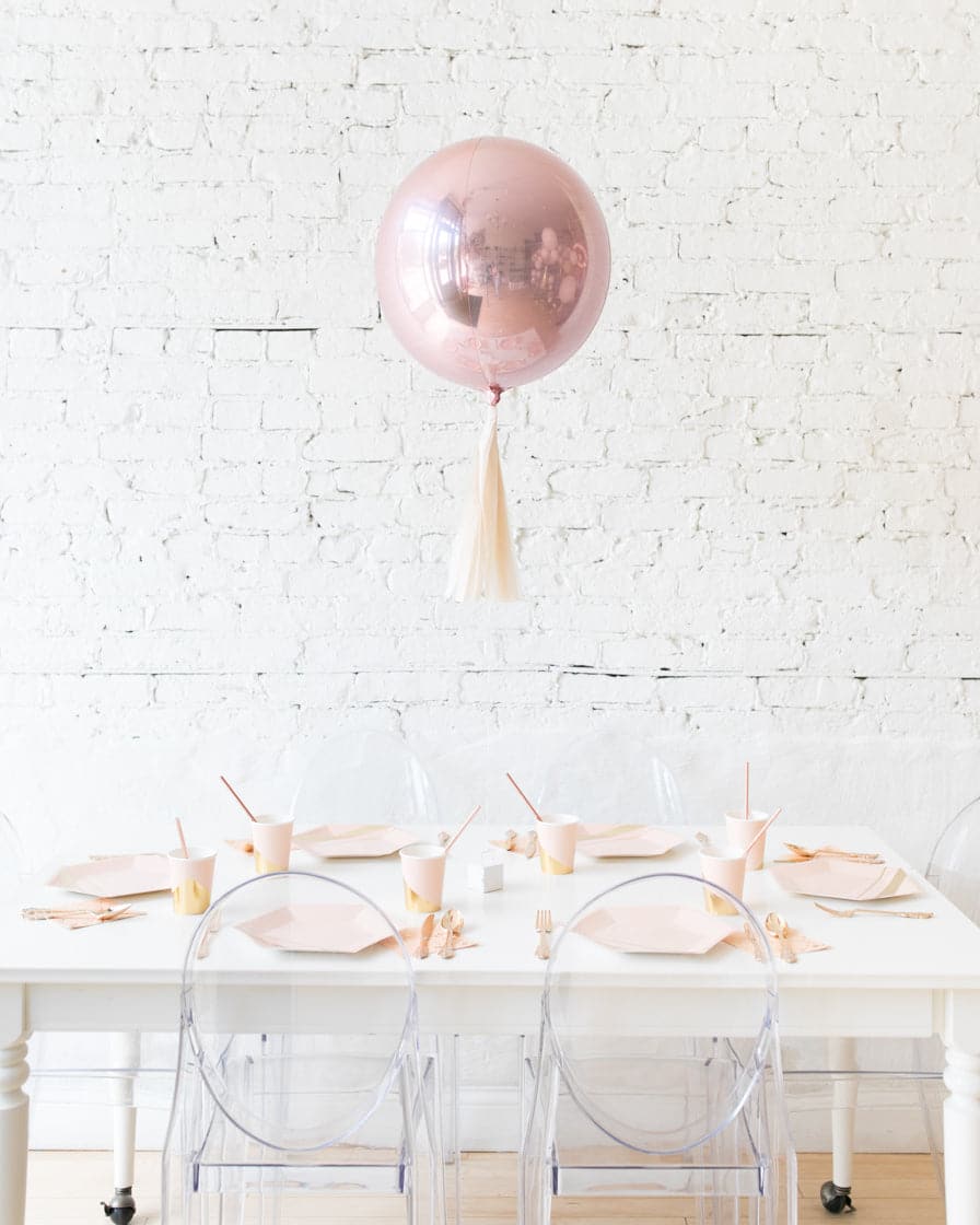 16in Rose Gold Orb Foil Balloon with Ivory Skirt Centerpiece | Rental