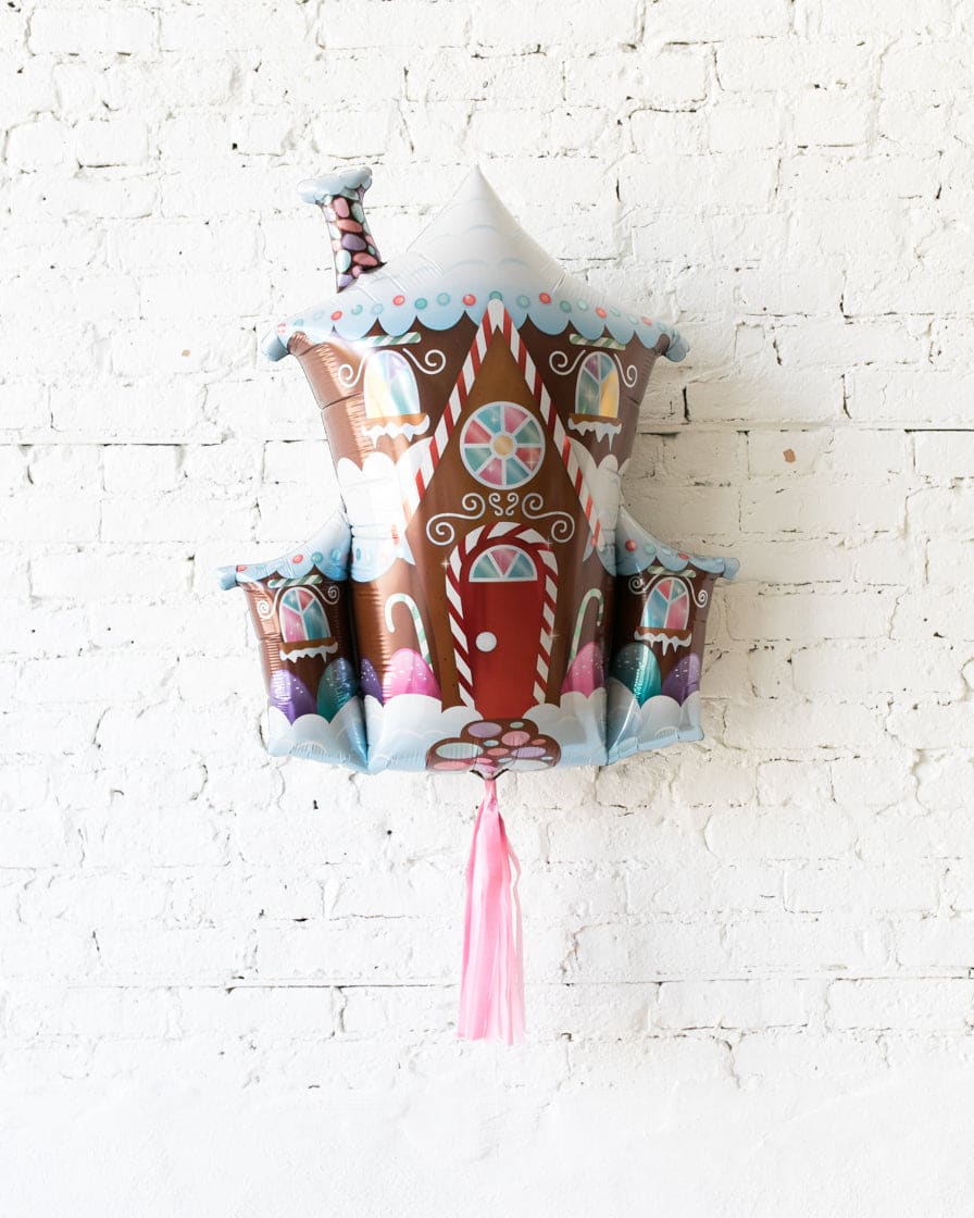 37in Gingerbread House Foil Balloon with Pink Skirt | Rental 37in Gingerbread House Foil Balloon with Pink Skirt | Rental