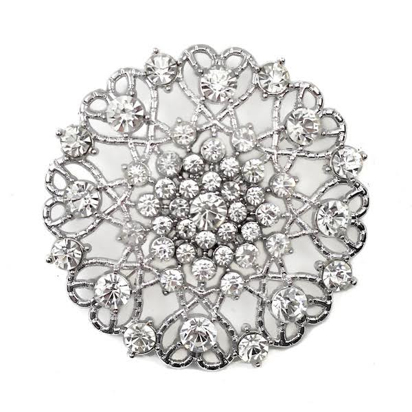 DecoStar™ Ornate Diamond-Encrusted Round Brooch in Silver | Rental DecoStar™ Ornate Diamond-Encrusted Round Brooch in Silver | Rental